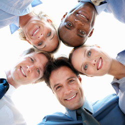 Teamwork isn't best communicated through huddle clip art