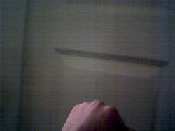 Hand knocking on door