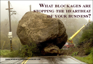 boulder on road