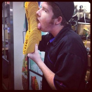 Taco Bell employee licking shells