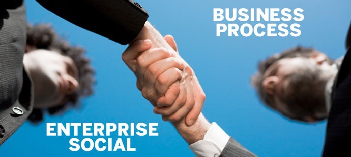 business handshake in the field with blue sky