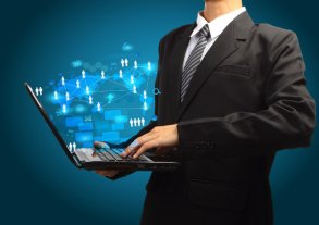 businessman holding laptop-internet connections