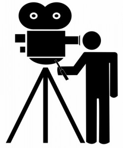 stick man or figure standing behind movie camera - vector