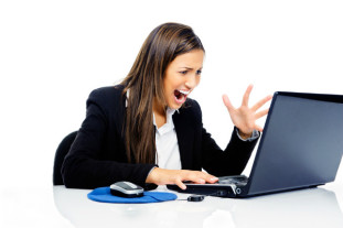 upset woman with laptop