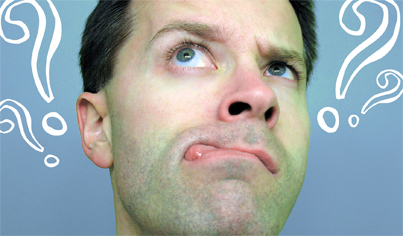 confused man with lots of question marks around him