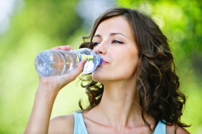 5 Ways to Boost a Sluggish Metabolism-woman drinking water
