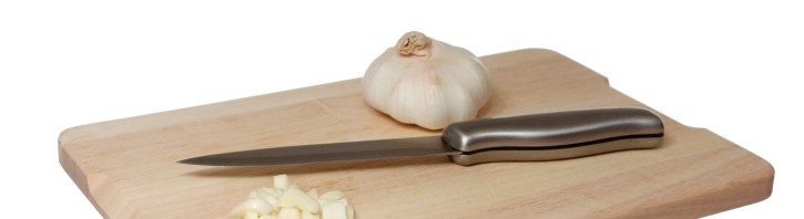 How to Peel and Slice Garlic Like a Pro-chopped garlic on cutting board