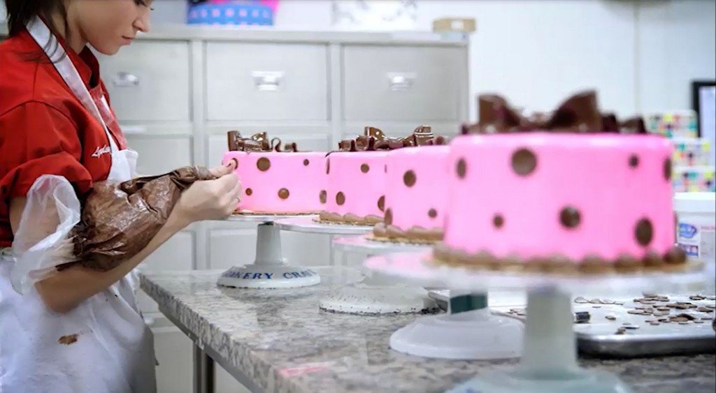cake boss employee decorating cakes