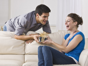 Woman laughing at Mother's Day gift
