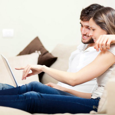 couple watching video from email