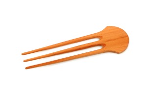A comb with three teeth.