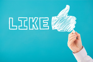 Handwritten LIKE and THUMBS UP social media