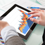 Close-up Of Hands Holding Digital Tablet
