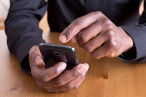 Man using smart phone
