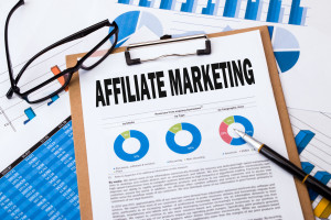 affiliate marketing analysis concept on clipboard