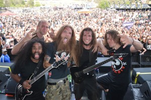 According to Spotify, fans of heavy music are the most loyal. Pictured: Battlecross posing in front of thousands of fans. (Photo credit: Sonny Guillen, Rockmywalls.com)