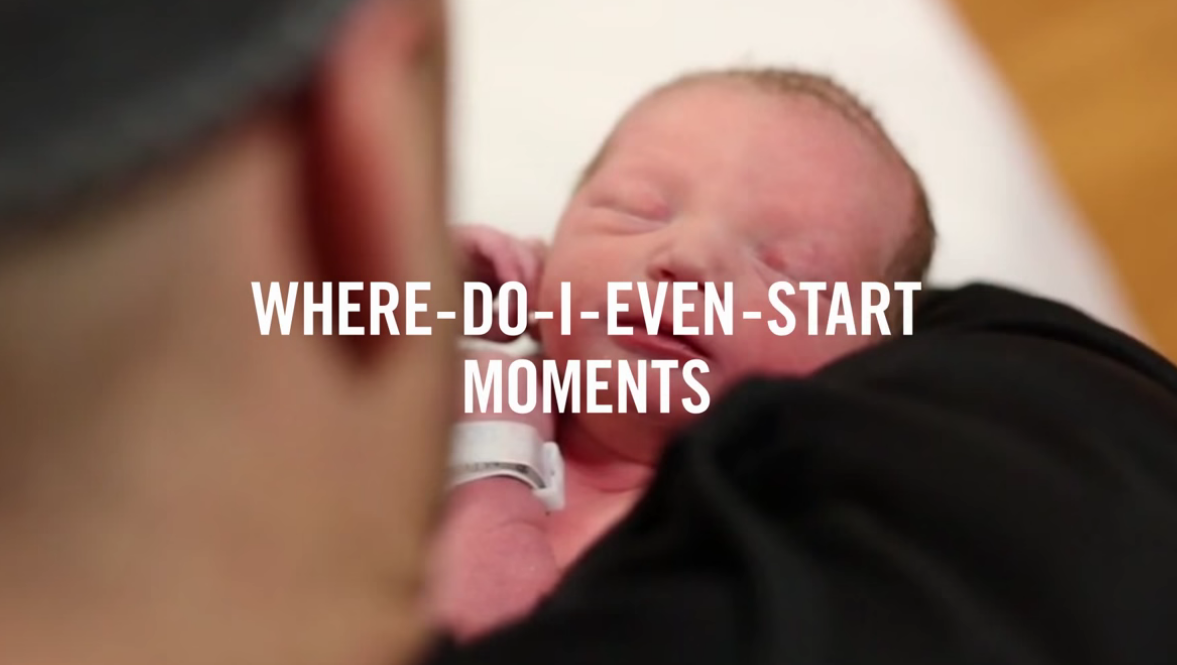 Cross-device image from Google's micro-moments video of a father holding his baby in a micro-moment