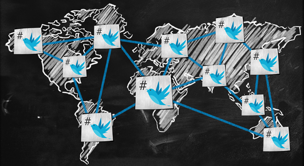 Map of the world in chalk with twitter birds and hashtags