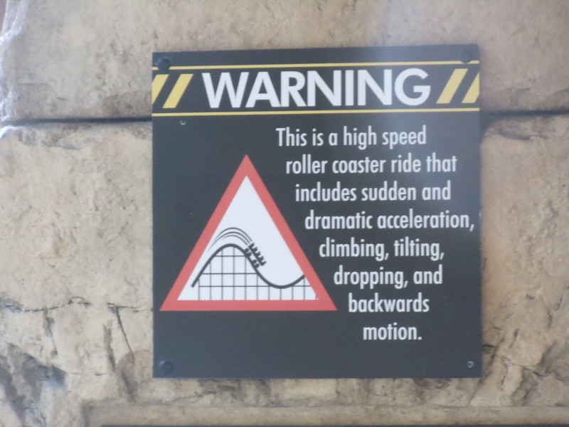 Photo credit: https://commons.wikimedia.org/wiki/File:USH-_The_Mummy_Ride_Warning.JPG#filelinks
