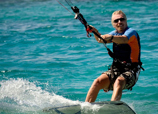 Richard Branson is a master content marketer, crafting powerful stories out of all aspects of his life---even kite surfing. (Photo: Dominic Lee, Priory Studios)