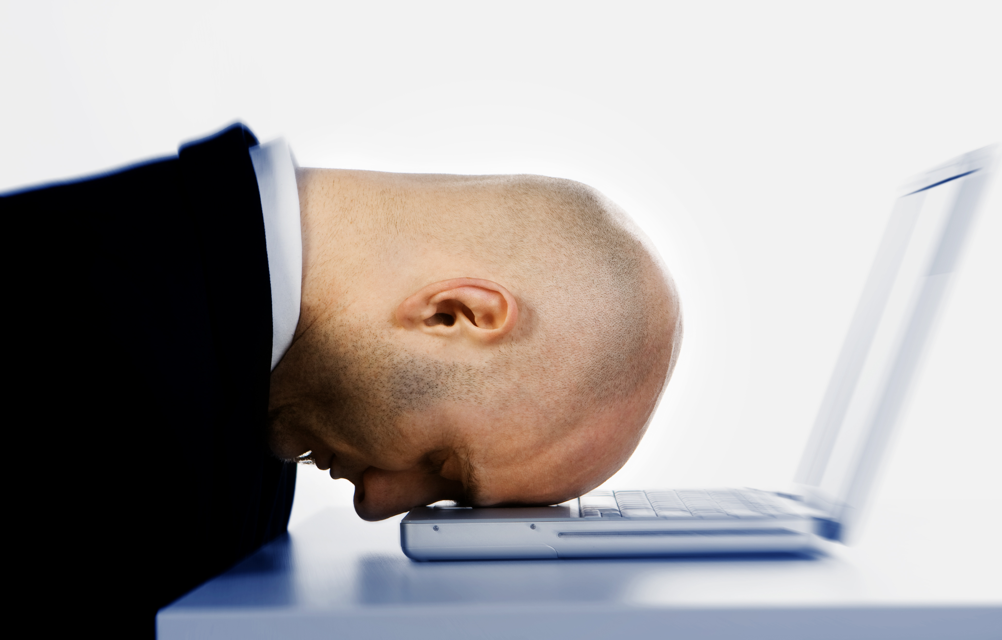 Stressed man and laptop