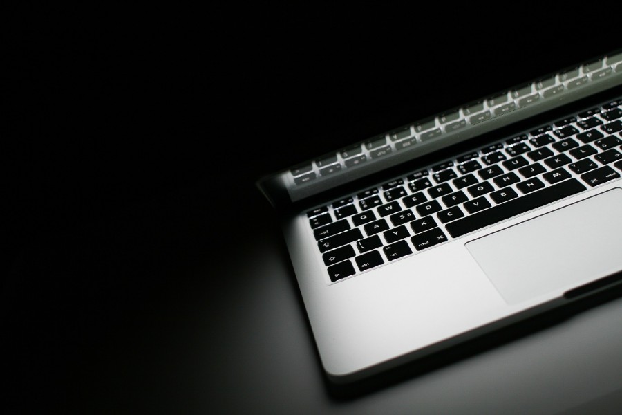 Laptop with black background and light