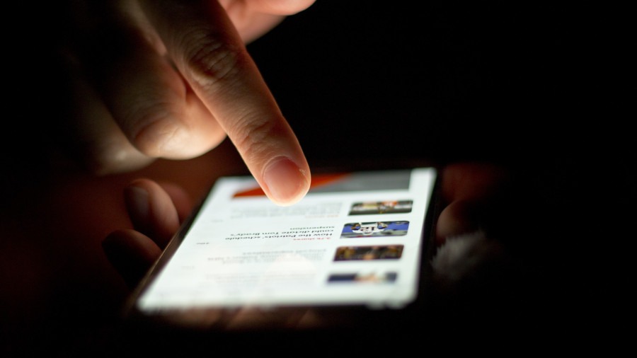 Person Touching Smartphone