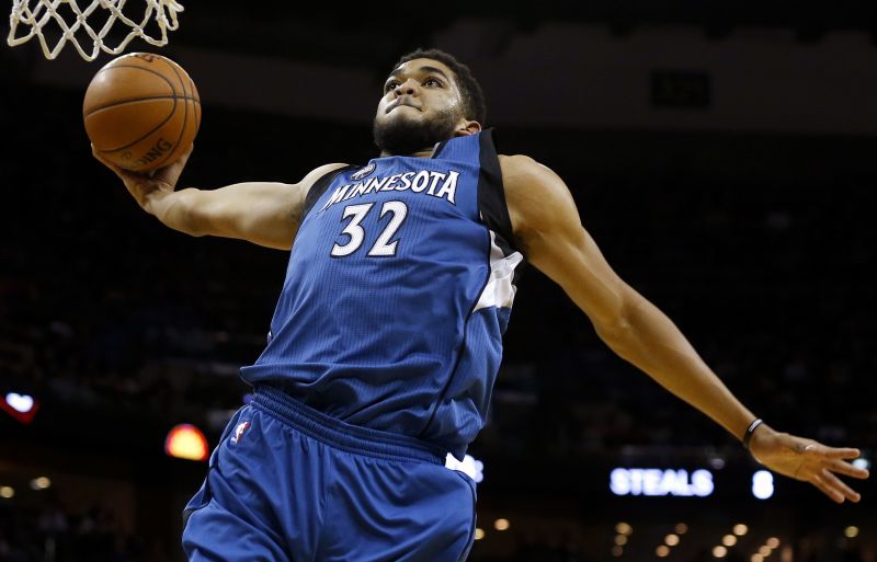 Minnesota Timberwolves rookie center Karl-Anthony Town skies for a dunk.