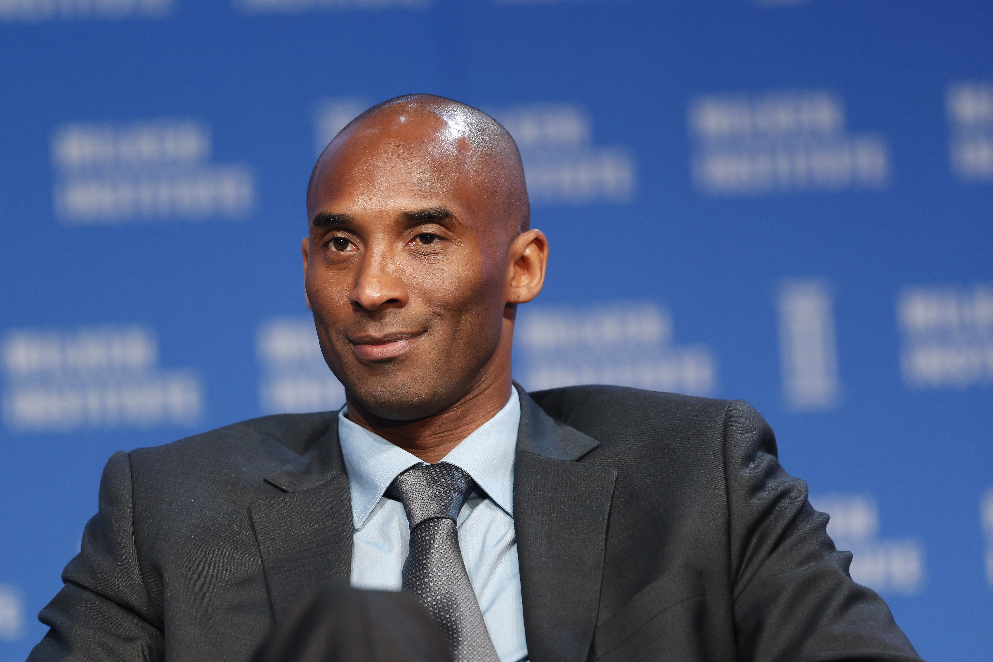Kobe Bryant, retired Lakers National Basketball Association (NBA) player, smiles during the annual Milken Institute Global Conference in Beverly Hills, California, U.S., on Tuesday, May 3, 2016. The conference gathers attendees to explore solutions to today