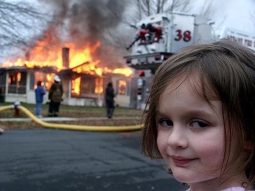 Buzzfeed Buzzfeed disaster-girl in front of a burning house