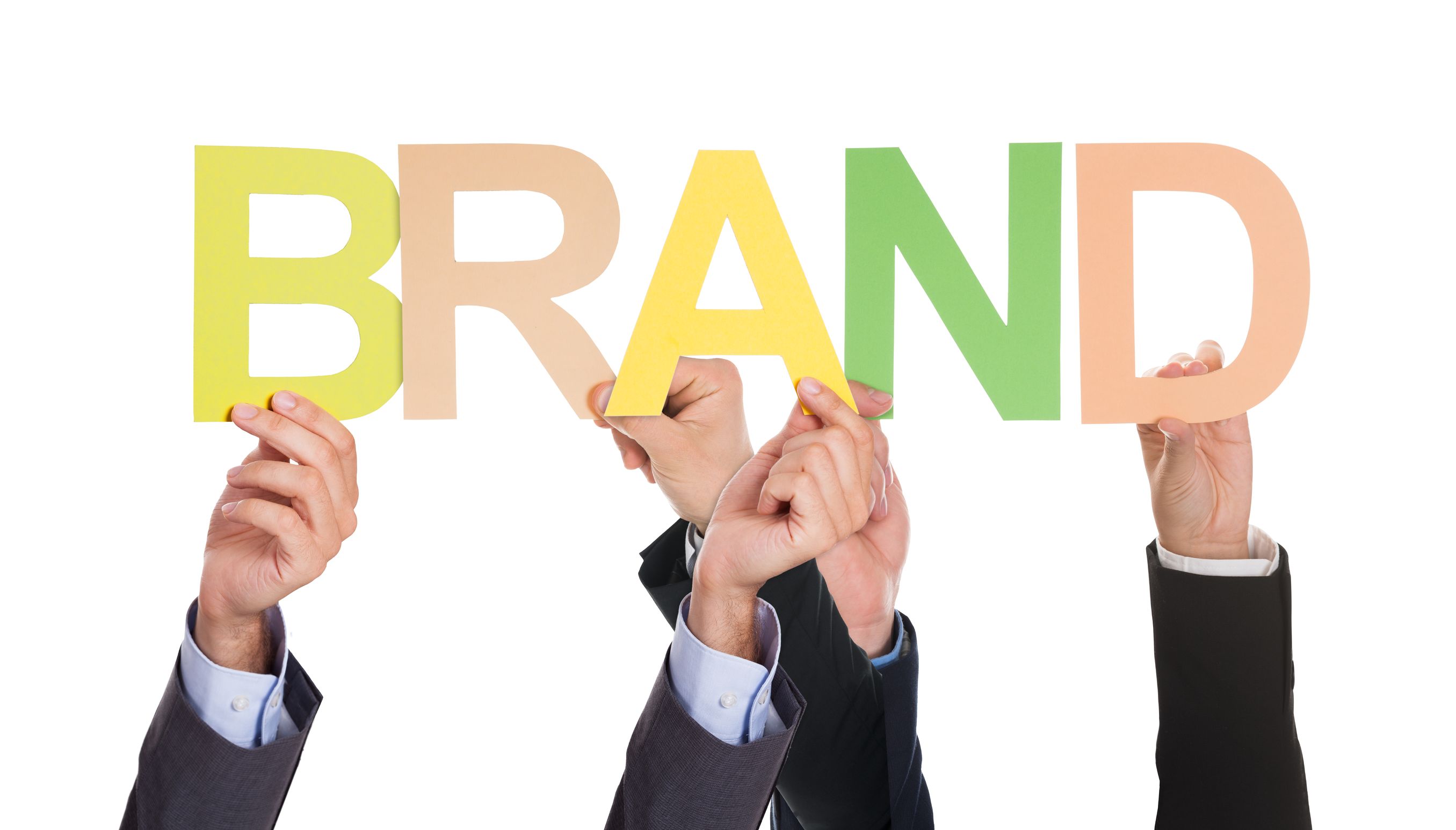 businesspeople-holding-the-word-brand