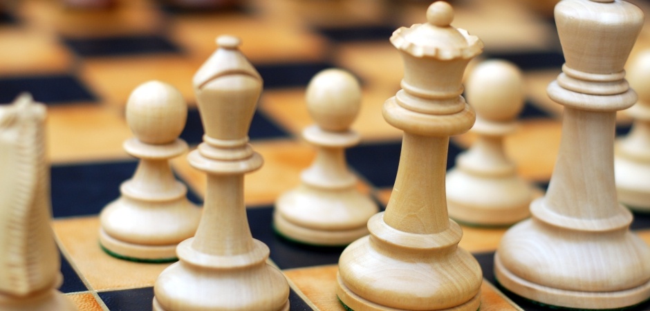 closeup of chess pieces on a chess board