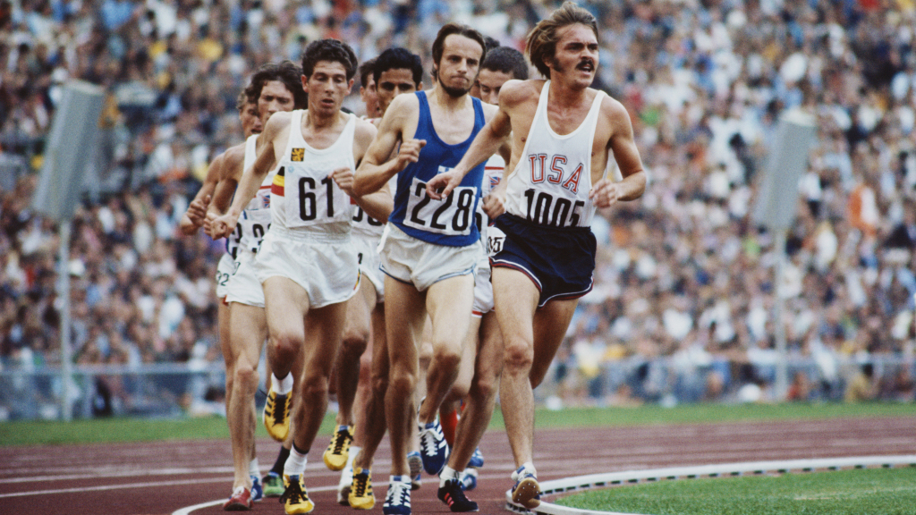 Steve Prefontaine #1005 of the United States leads Lasse Viren of Finland #228 and Emiel Puttemans of Belgium #61 during the Men's 5,000 metres event at the XX Summer Olympic Games on 10 September 1972 at the Olympic Stadium in Munich, Germany.(Photo by Tony Duffy/Getty Images)