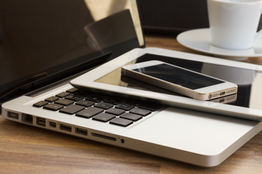 Image of laptop, smartphone, tabletshowing importance of responsive web design.