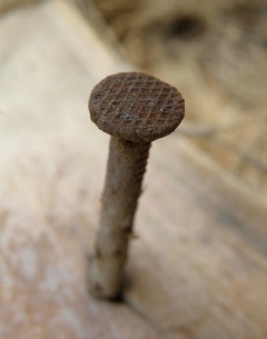 If I hammer a nail into a solid piece of wood, an overwhelming majority of the time the head of the nail will end up flush with the wood surface. That
