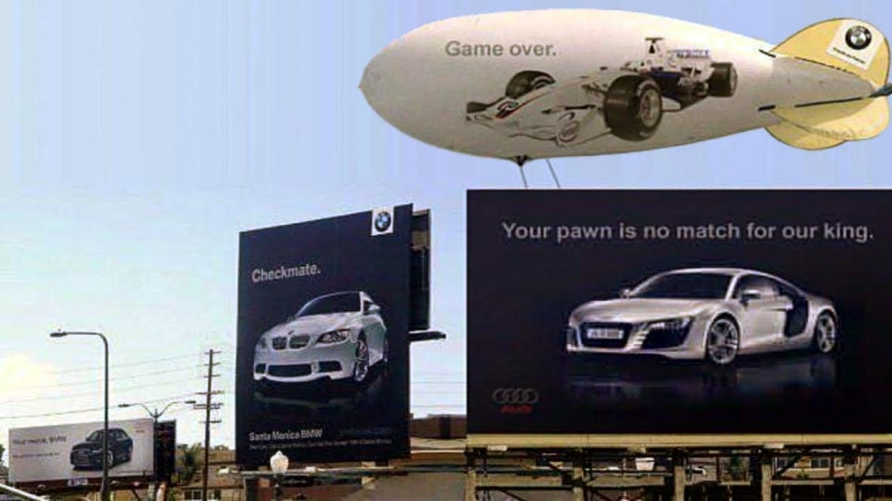 Ambush marketing Audi vs. BMW billboard war blimp game over