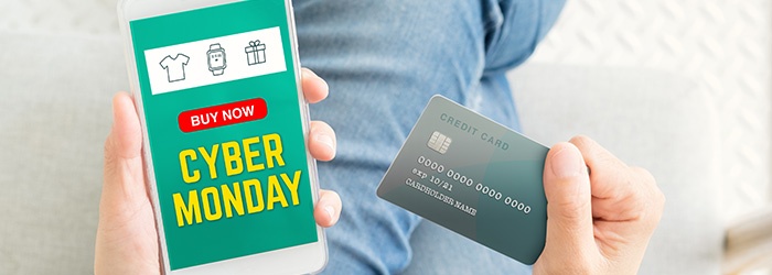 cyber-Monday-sale-using-credit-card-to-buy-with-promo-code,Top-view-close-up-woman-hand-shopping-online-with-mobile-app,digital-marketing-concept-865548406_700x250