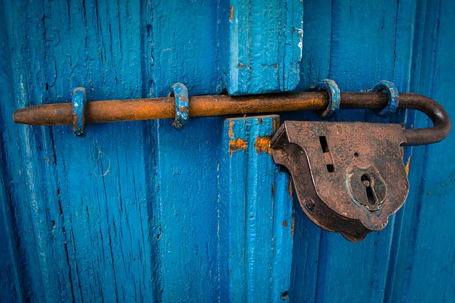 door with old key locking the door