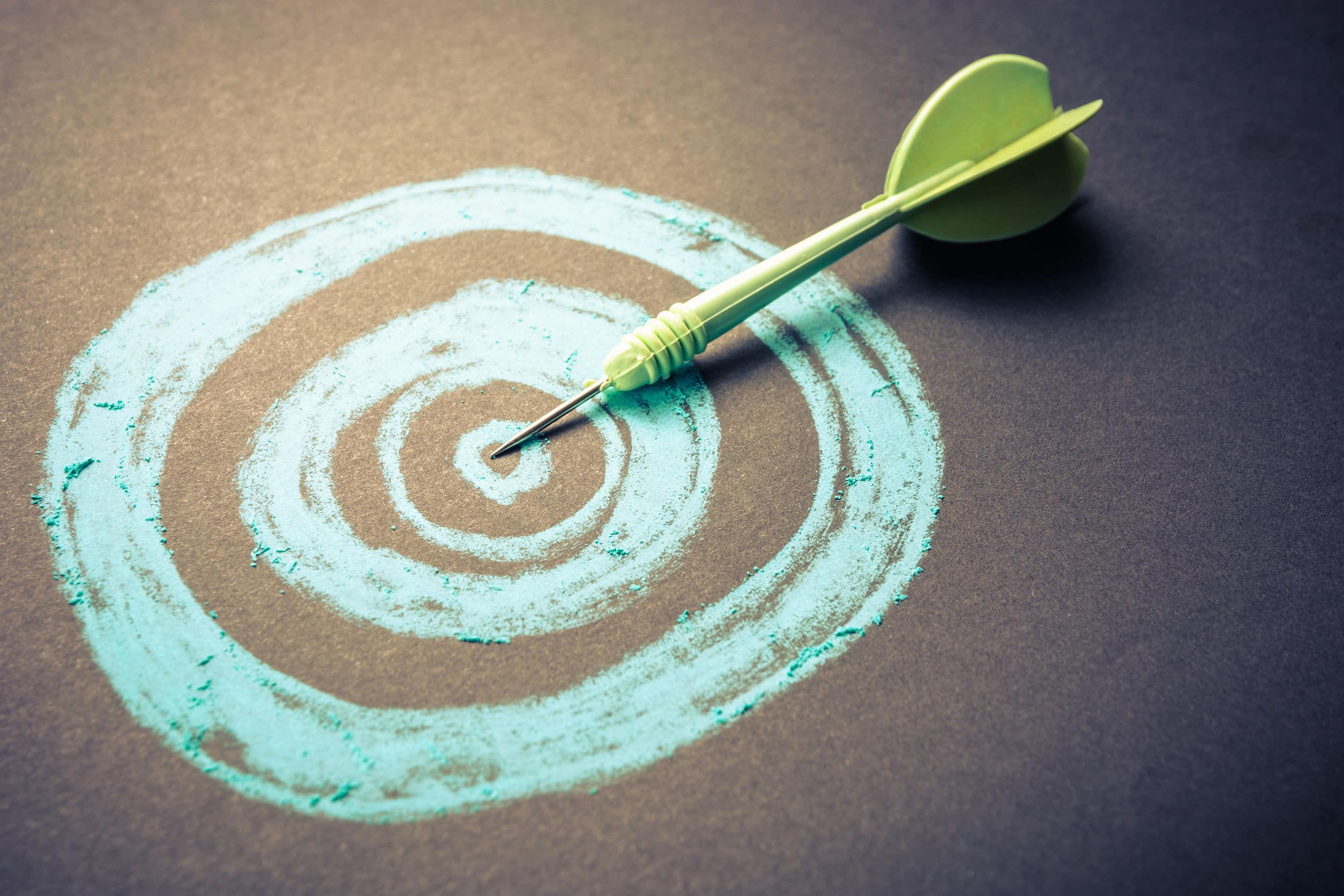 Goal setting, drawing target with dart pin at the center