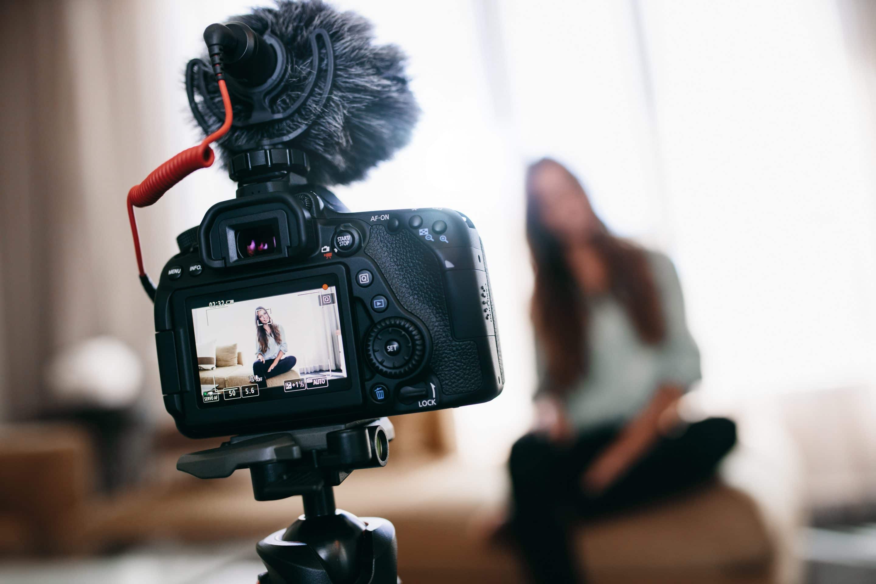Woman recording a Youtube video