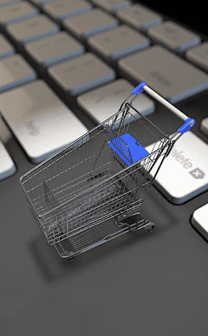 ecommerce cart on computer keyboard
