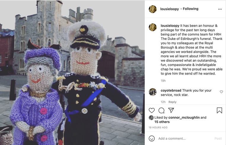 Screenshot of an Instagram post depicting two knitted dolls of the Queen and Prince Phillip outside Windsor Castle.