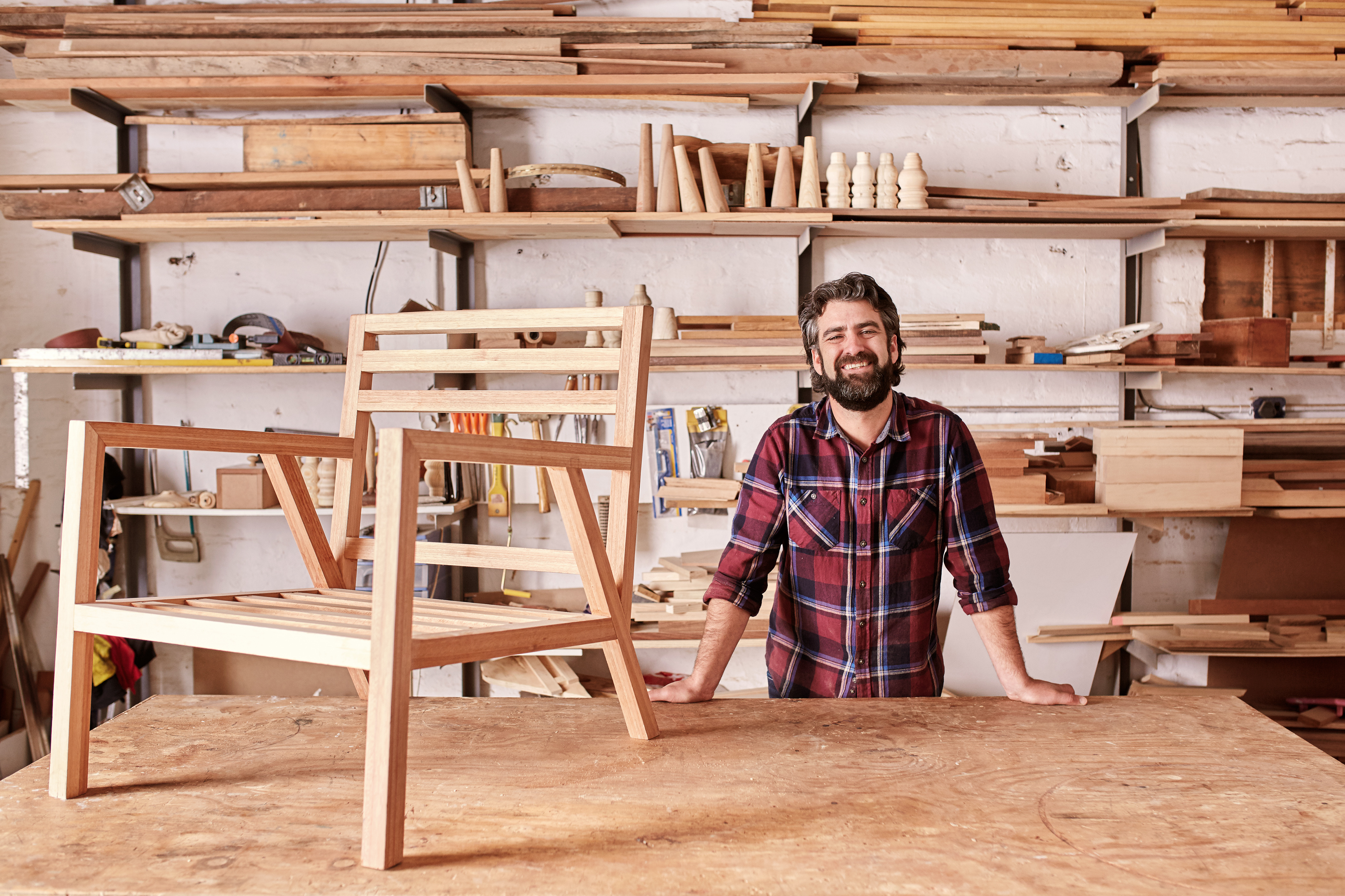 types of businesses - this furniture maker is a solopreneur but he can choose from several different business structures