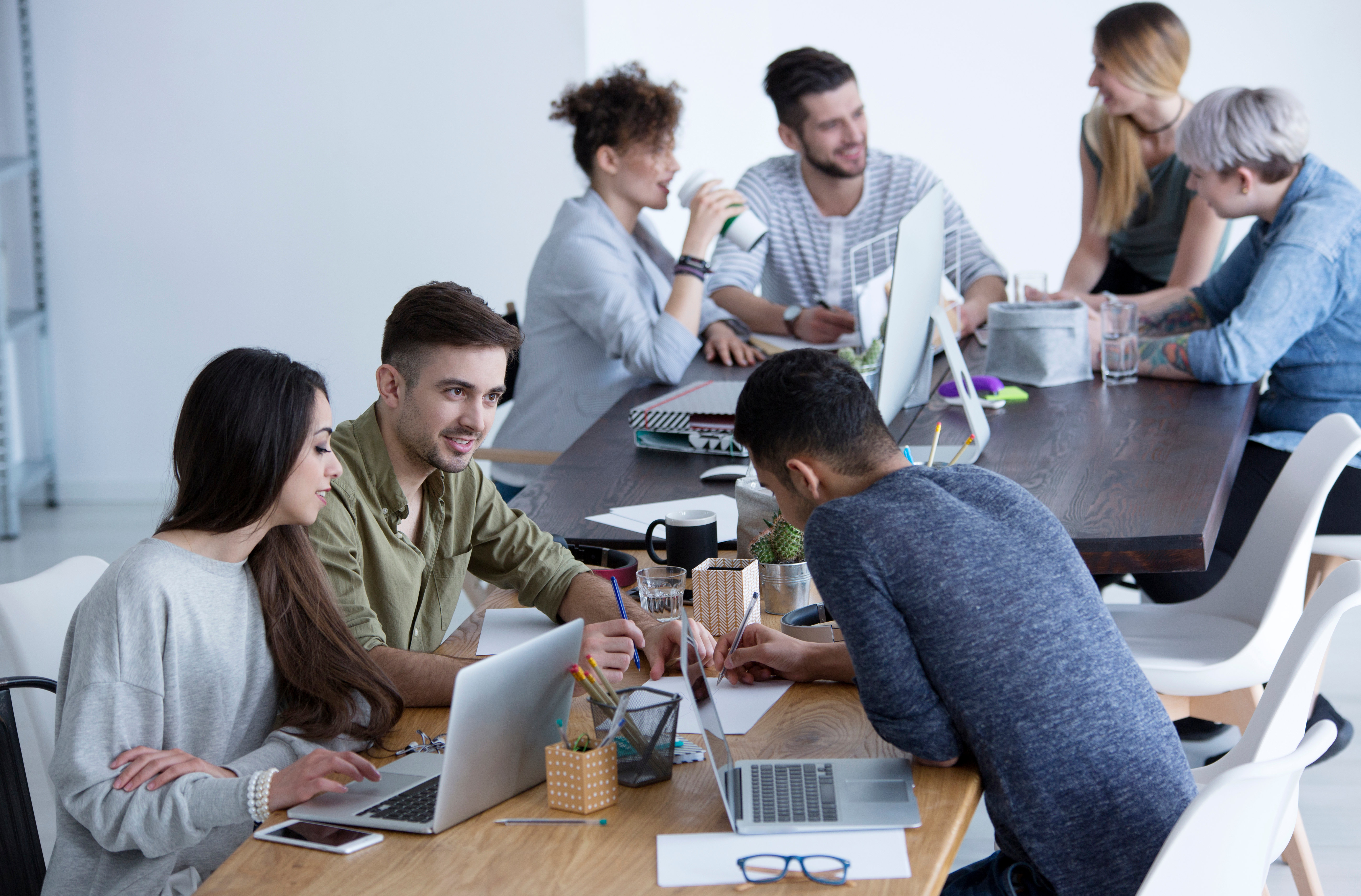 A public relations agency working together and communicating 