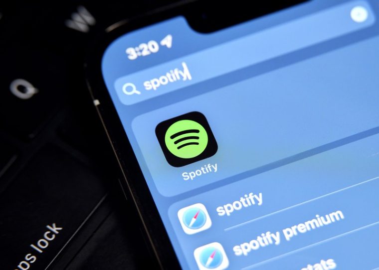 spotify makes changes to its podcast business