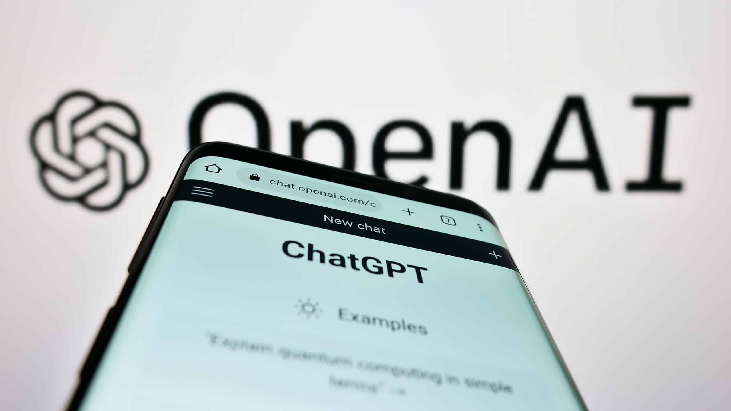 open ai logo in background with phone