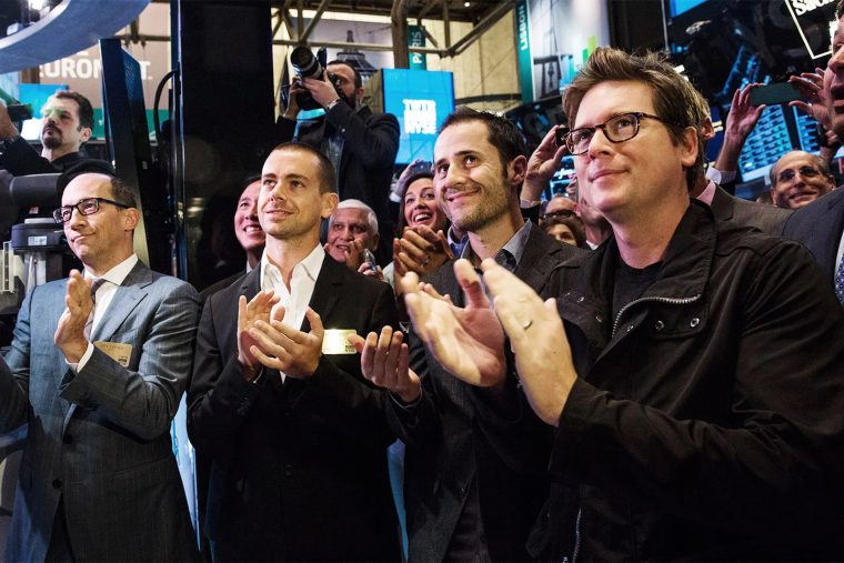 Jack Dorsey and 3 other men clapping