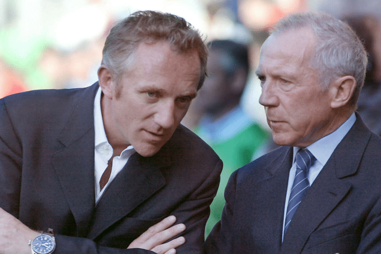 François Henri Pinault speaking to another man