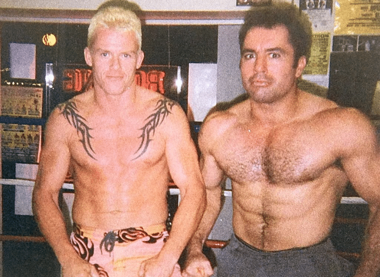 buff Joe Rogan with a fighting partner