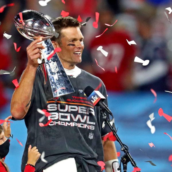 Tom Brady with the Lombardy Trophy